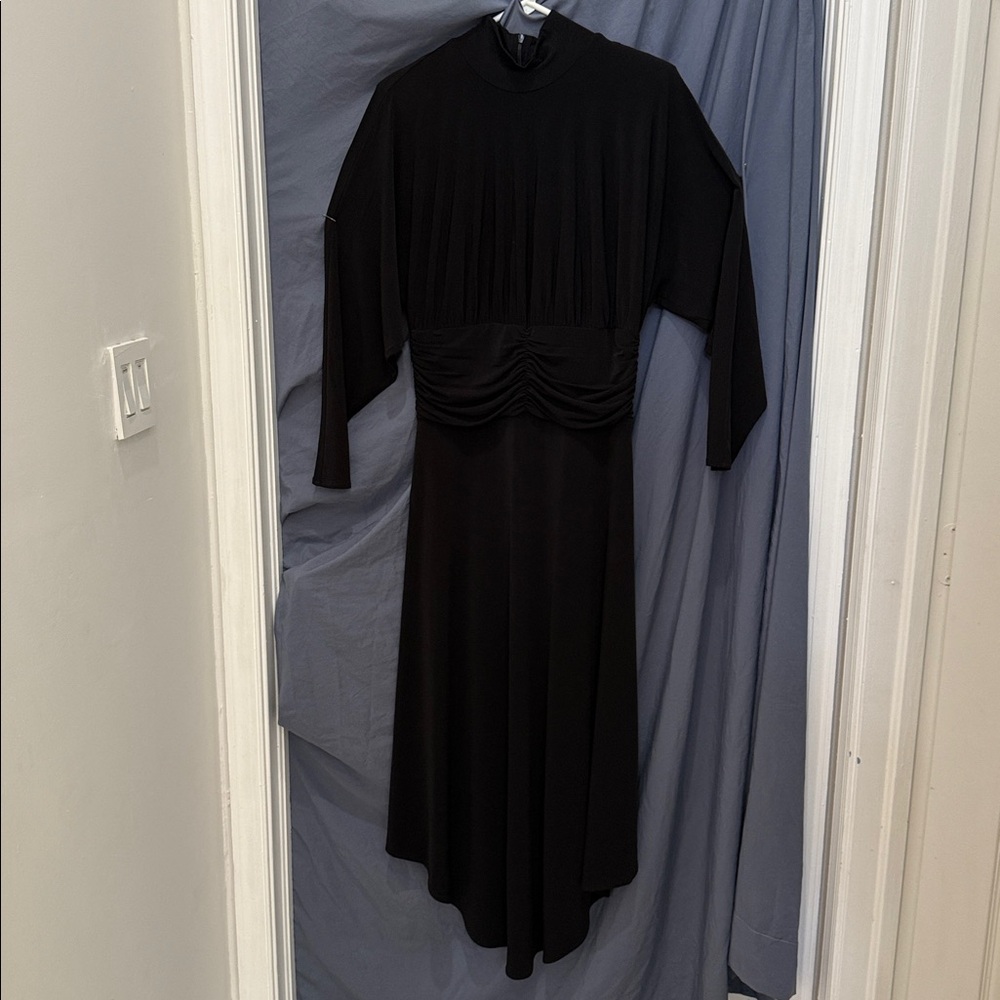 BCBGMaxAzria Black Dress, high neck, shoulder pads and zipper back. Size M